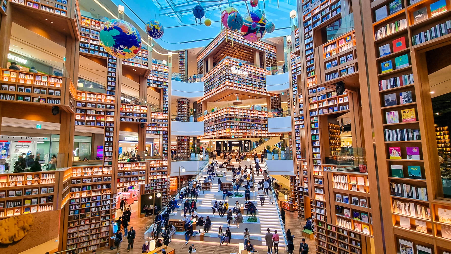Starfield Library at Coex Mall Seoul — multi-story bookshelf atrium used as a film location for Korean dramas and brand campaigns