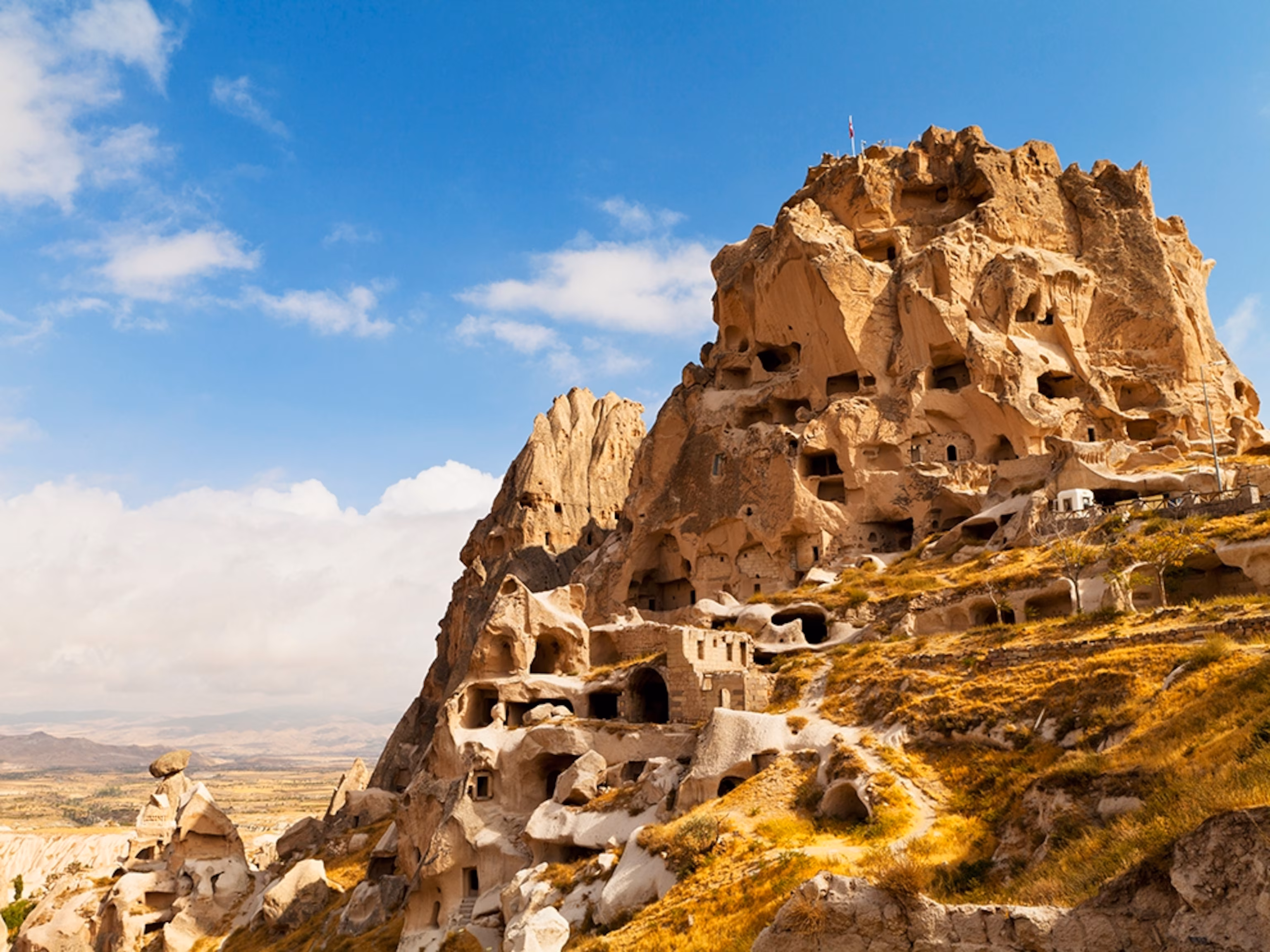 Uchisar Castle and cave dwellings in the Cappadocia rock landscape